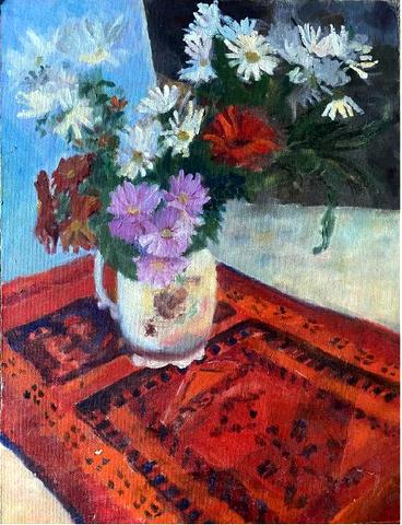 Flowers in a Vase on a Red Mat