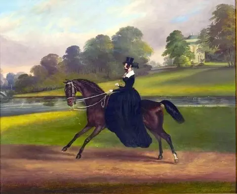 Emma Sparrow, riding her hunter, Anachase, in the grounds of Gosfield Place